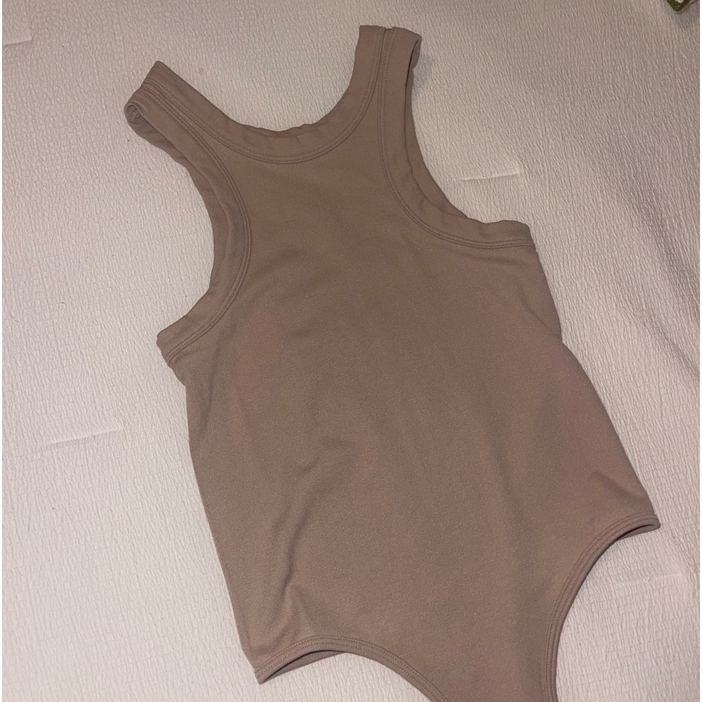 Dynamic bodysuit, one size (fits like a small, but extremely stretchy) beige